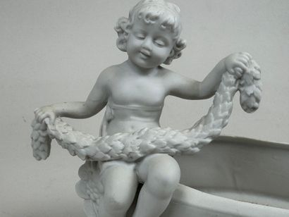 20th century school. 
Cherub with laurel...
