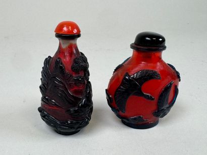 ASIA, 20th century.
Two glass snuffboxes...