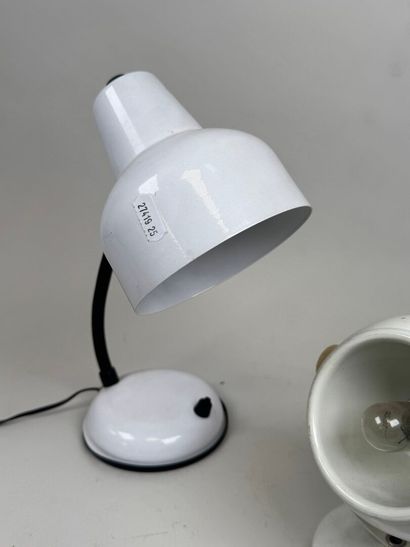 Two plastic and white metal lamps, one hinged.
20th...