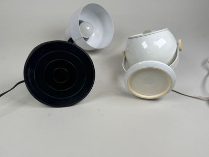 Two plastic and white metal lamps, one hinged.
20th...