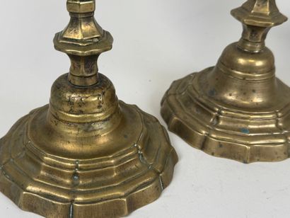 Pair of bronze candlesticks, scalloped base.
19th...