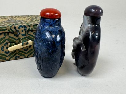 ASIA, 20th century.
Two carved hardstone...