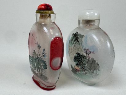ASIA, 20th century.
Two glass snuffboxes...