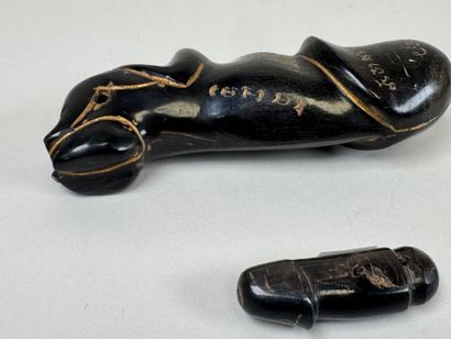ASIA, 20th century.
Set of two carved horn...