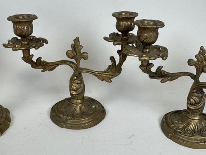 Pair of bronze candlesticks, scalloped base.
19th...