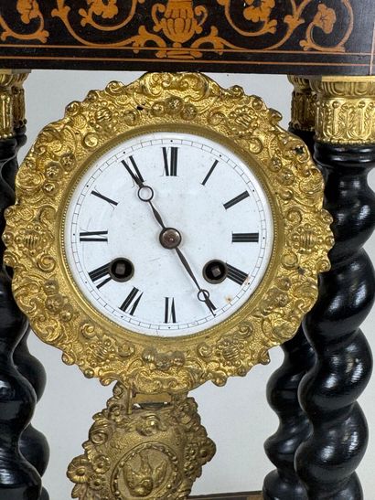 Portico clock in blackened wood, the base...