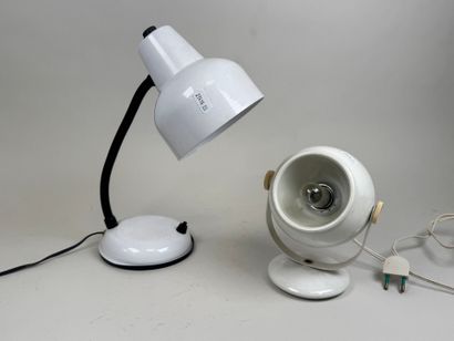 Two plastic and white metal lamps, one hinged.
20th...