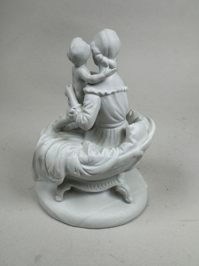 20th century school. 
Mother and Child. 
Porcelain...