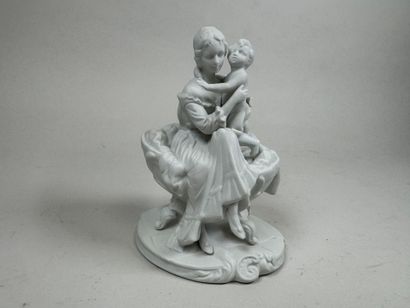 20th century school. 
Mother and Child. 
Porcelain...