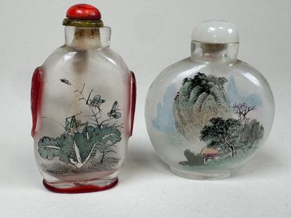 ASIA, 20th century.
Two glass snuffboxes...