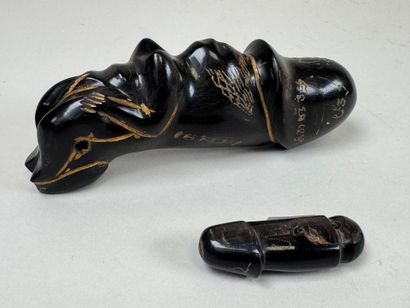 ASIA, 20th century.
Set of two carved horn...