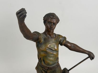 Le Travail. 
Large patinated bronze subject...