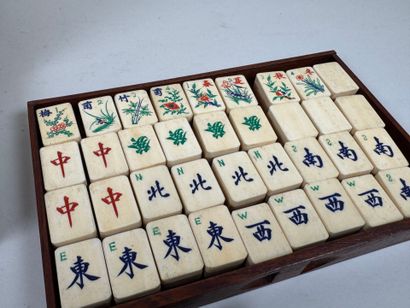 Mahjong set in exotic wood and gilded metal...