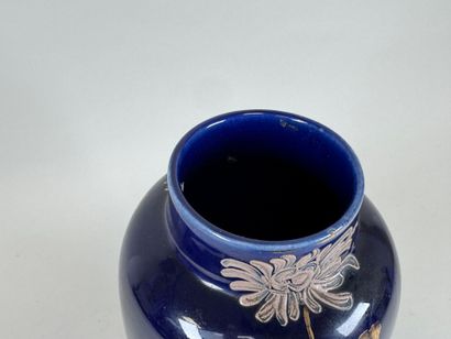 Ceramic vase on a blue background, decorated...