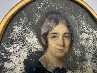 School, 19th century.
Portrait of a woman.
Oval...