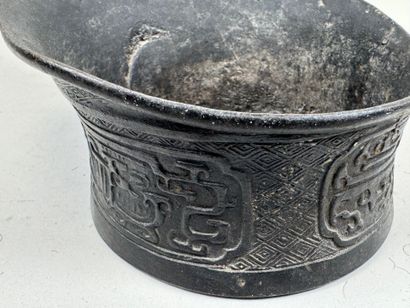 Vietnam, 20th century.
Bronze iron with chased...