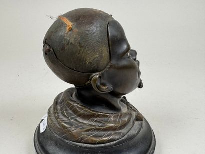 Bronze desk inkwell decorated with a man's...