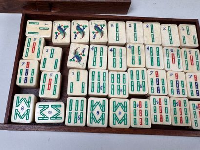 Mahjong set in exotic wood and gilded metal...