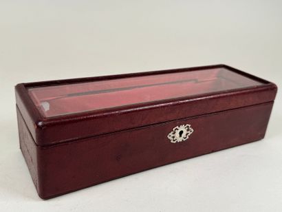 Rectangular glove box in burgundy leather-wrapped...