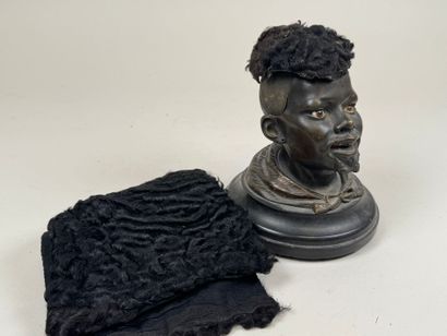 Bronze desk inkwell decorated with a man's...