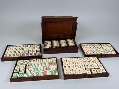 Mahjong set in exotic wood and gilded metal...
