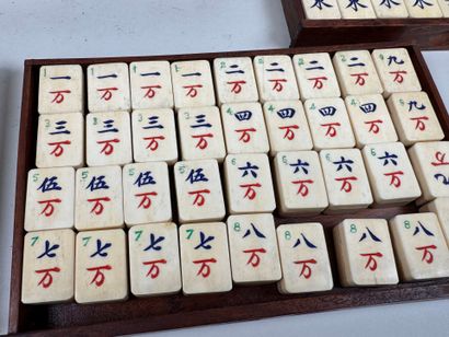Mahjong set in exotic wood and gilded metal...