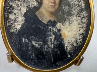 School, 19th century.
Portrait of a woman.
Oval...