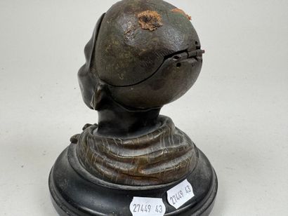 Bronze desk inkwell decorated with a man's...