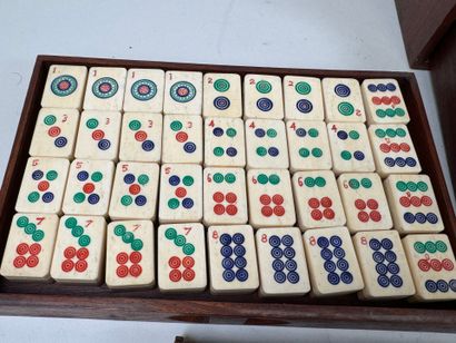 Mahjong set in exotic wood and gilded metal...