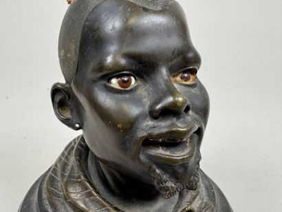 Bronze desk inkwell decorated with a man's...