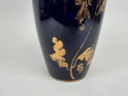 Ceramic vase on a blue background, decorated...