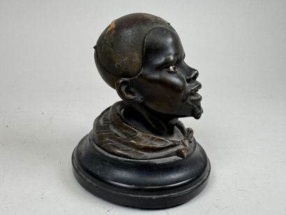 Bronze desk inkwell decorated with a man's...