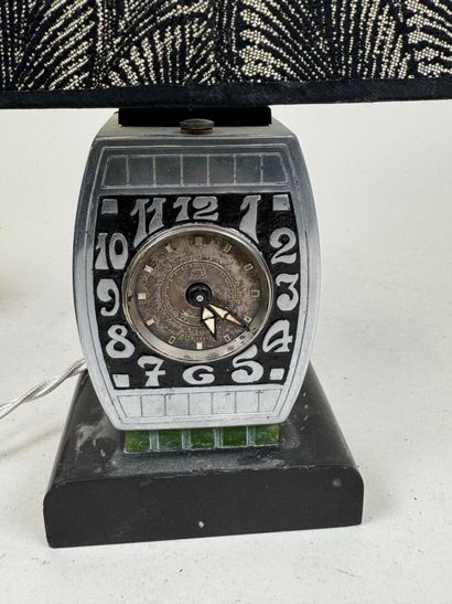 COTNA.
Small clock in metal or brushed aluminum,...