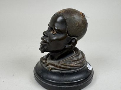 Bronze desk inkwell decorated with a man's...
