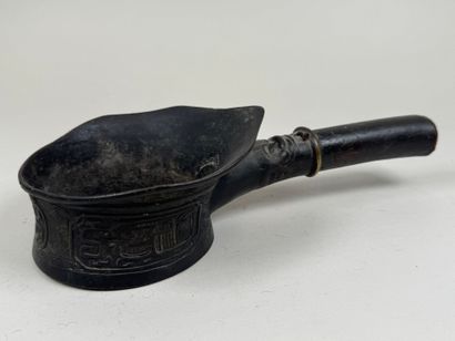Vietnam, 20th century.
Bronze iron with chased...