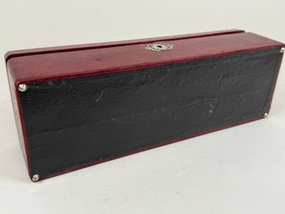Rectangular glove box in burgundy leather-wrapped...