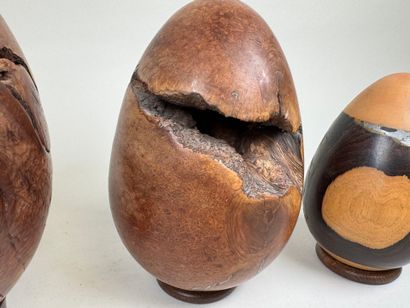 Three turned briar roots and egg-shaped metal...