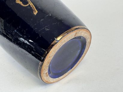 Ceramic vase on a blue background, decorated...