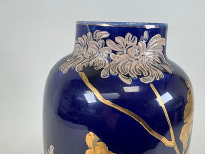 Ceramic vase on a blue background, decorated...