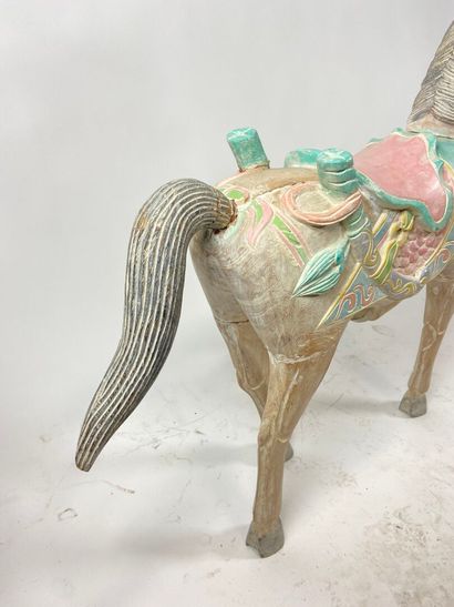 Modern merry-go-round horse in polychrome...