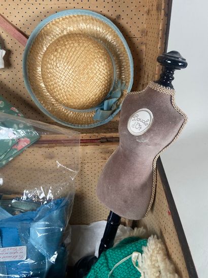 Antique travel trunk containing recent knitted...