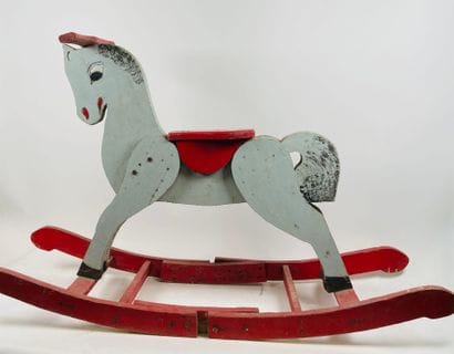 Polychrome wooden rocking horse.
61 x 98...