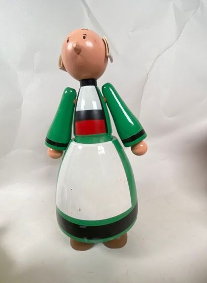 Two rolling pull-along toys:
- Donald and...