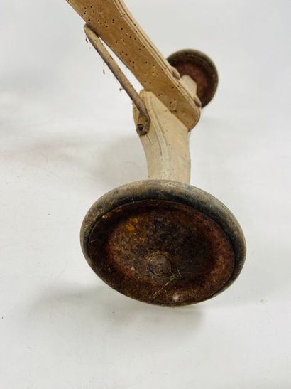 Wood and metal tricycle, adjustable seat.
59...