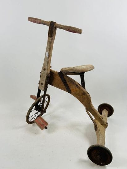 Wood and metal tricycle, adjustable seat.
59...