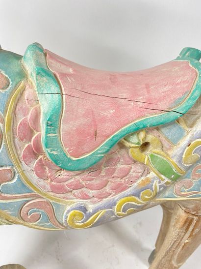 Modern merry-go-round horse in polychrome...