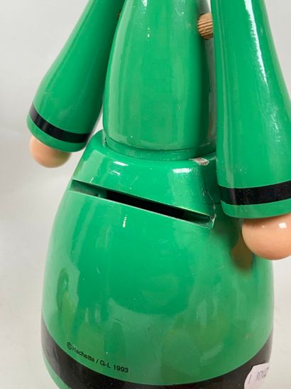 Two rolling pull-along toys:
- Donald and...