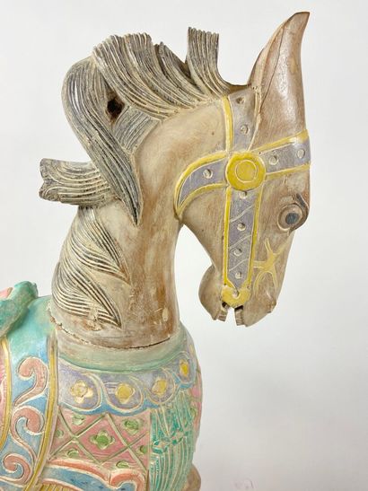 Modern merry-go-round horse in polychrome...