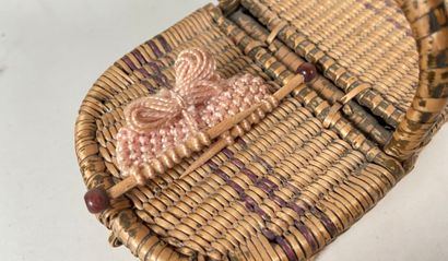 Four wicker picnic baskets with handles and...