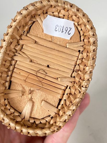 Four wicker picnic baskets with handles and...